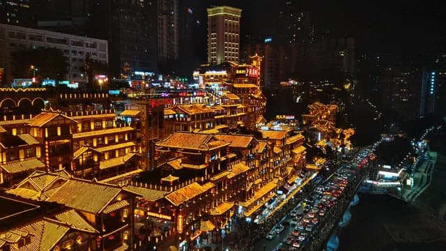 Hongya Cave and Chongqing's layered riverfront at night