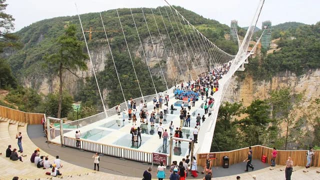 The glass bridge crossing Zhangjiajie Grand Canyon
